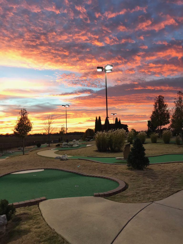 Sunset over a beautiful golf course landscape